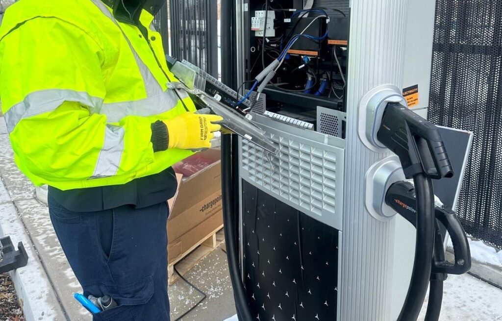 EVSE technician performing EV charger diagnostics, predictive maintenance, reliability engineering, and Operations & Maintenance (O&M) for EV charging infrastructure.